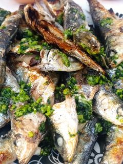 Una foto de Sardinas asadas