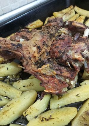 A picture of Roast Lamb with Potatoes.