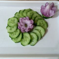 A picture of Salad, cucumber and onion🥒🧅🥒🧅.
