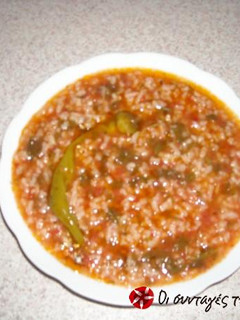 A picture of Tomato rice in the pot.