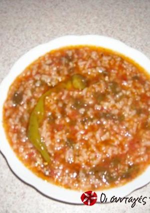 A picture of Tomato rice in the pot.