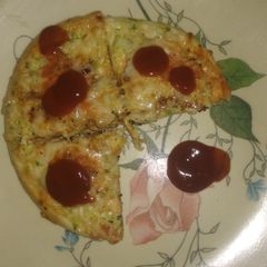 A picture of Chicken pizza with Cheese.
