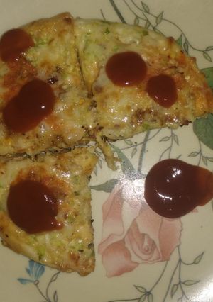 A picture of Chicken pizza with Cheese.