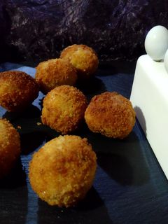 Una foto de Bolitas de patata y carne