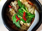 A picture of enoki mushroom with beef