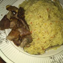 A picture of Indomie with roast meat.