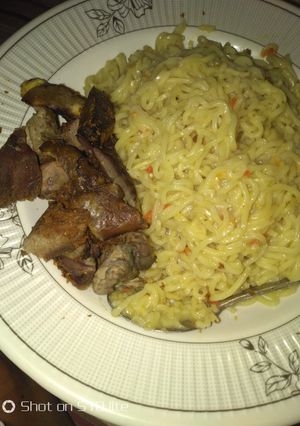 A picture of Indomie with roast meat.