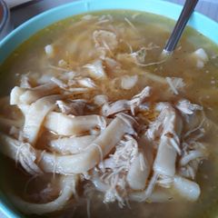 A picture of Homemade chicken noodle soup, with a kick..