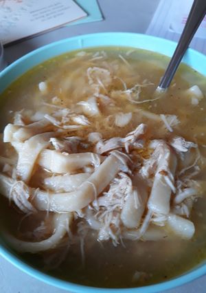 A picture of Homemade chicken noodle soup, with a kick..