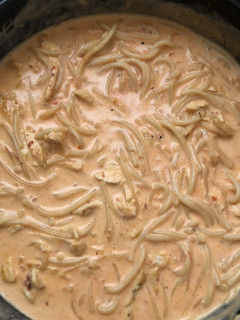 Una foto de Pasta con pollo al chipotle con crema y queso