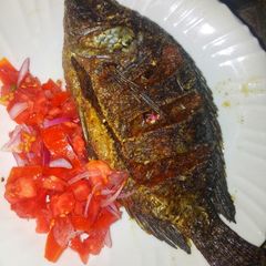 A picture of Fried Nile perch with kachumbari #themechallenge.