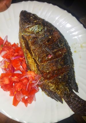 A picture of Fried Nile perch with kachumbari #themechallenge.