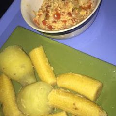 A picture of Boiled potato and plantain and egg sauce.