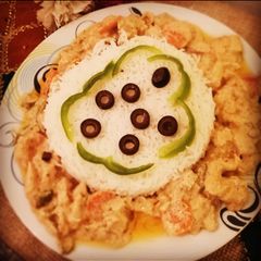 A picture of Garlic rice with chicken Sizzler.