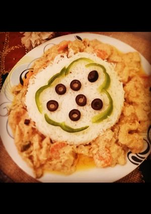 A picture of Garlic rice with chicken Sizzler.