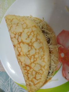 Una foto de Crepes saladas de champiñones, tomate y queso
