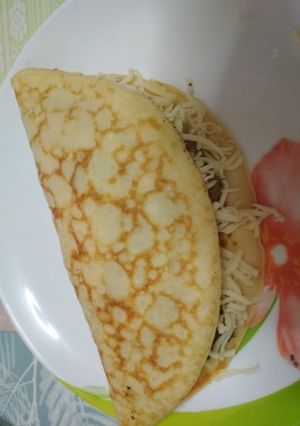 Una foto de Crepes saladas de champiñones, tomate y queso