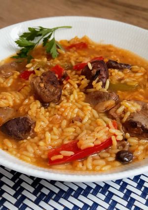 Una foto de Arroz con magret de pato