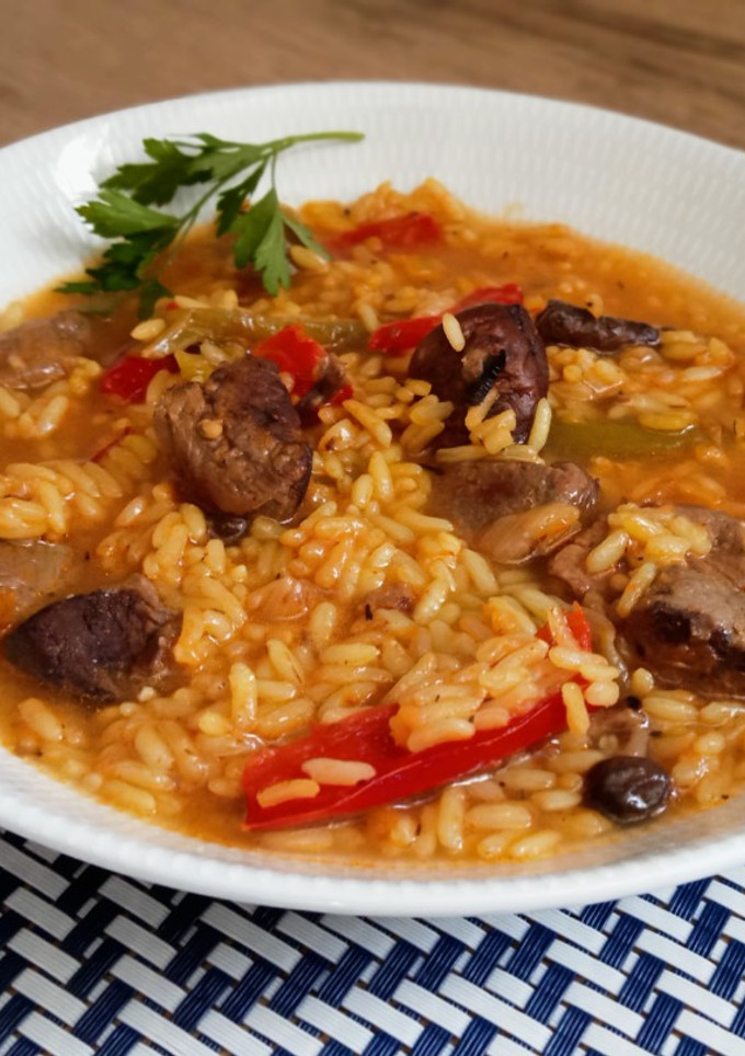 Una foto de Arroz con magret de pato