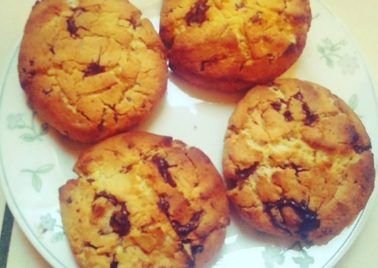 Recette De Cookies noix de coco, chocolat et cacahuettes concassées