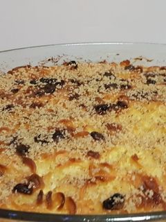 O poză a rețetei Budincă din paste cu brânză dulce și stafide.