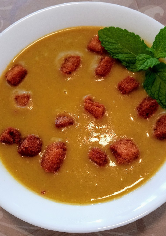 Una foto de Crema de calabaza y espinacas