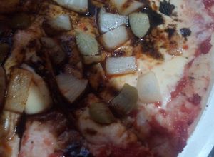 Una foto de Pizza tropical