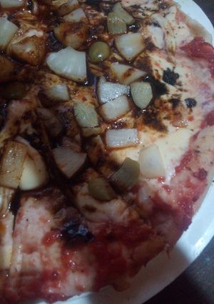 Una foto de Pizza tropical