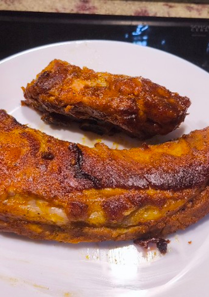 Una foto de Costillar de cerdo al horno con salsa barbacoa 😋