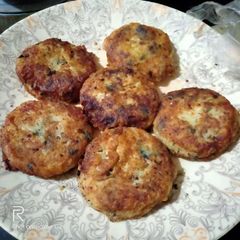 A picture of Alu k cutlet combination of kadhi chawal.