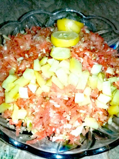A picture of Carrots and cabbage salad.