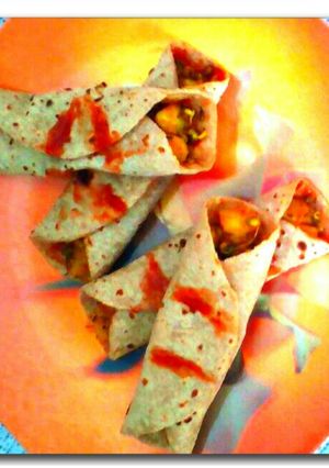 A picture of Jeera masala aloo sprouts roti roll.