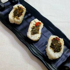 A picture of Spinach Stuffed Sushi Rolls.