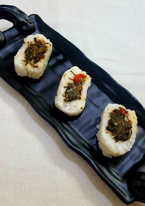 A picture of Spinach Stuffed Sushi Rolls.