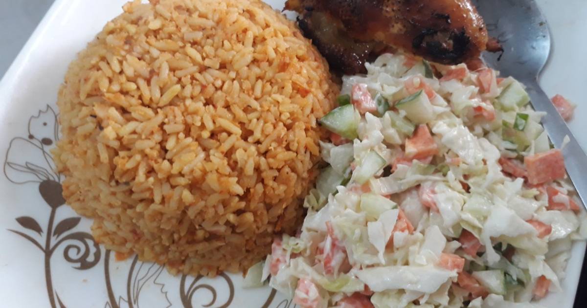 Jollof Rice and Chicken with Coleslaw - Travelandmunchies