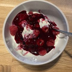 A picture of Breakfast Granola with Rhubarb compote.