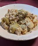 Arroz salteado con pulpo y alcachofas baby