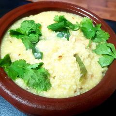 A picture of Foxtail Millet with Dal.