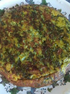 Una foto de Tortilla de espinacas, cebolla y patata