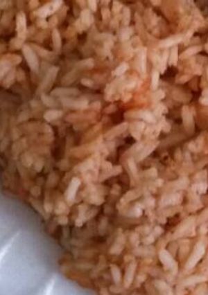 Una foto de Sopa de arroz rojo