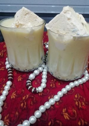 A picture of Mango Thandai Shake with ice cream.