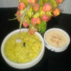 A picture of Arhar Daal khichdi with boondi Raita.