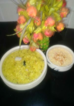A picture of Arhar Daal khichdi with boondi Raita.