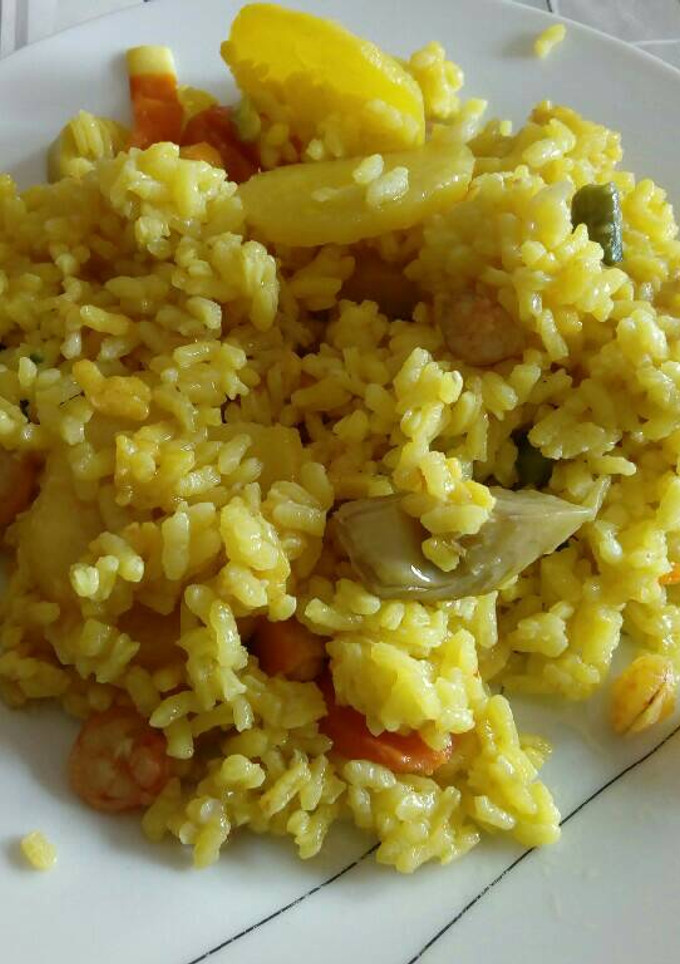 Una foto de Arroz con cosas
