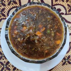A picture of Hot and sour soup.