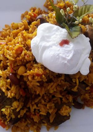 Una foto de Arroz con Carne de Res y Huevo Escalfado a lo Carmelita