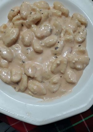 Una foto de Ñoquis de ricota con salsa rosa