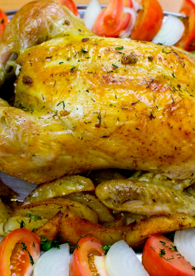 Una foto de Pollo asado en bolsa con patatas al horno