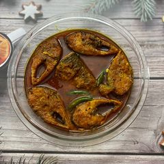 A picture of Spicy Hilsa Curry.