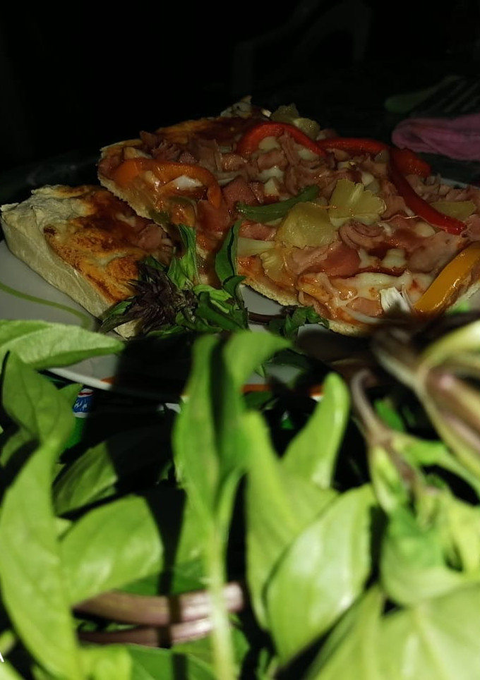 Una foto de Pizza